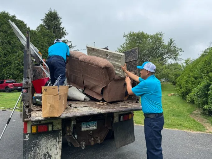 Family Cleanout Junk Removal crew handling furniture disposal in Niantic and East Lyme, CT